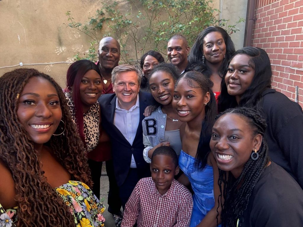 Aled Jones with Estelle, Eddie and her wider family in a group photo. 