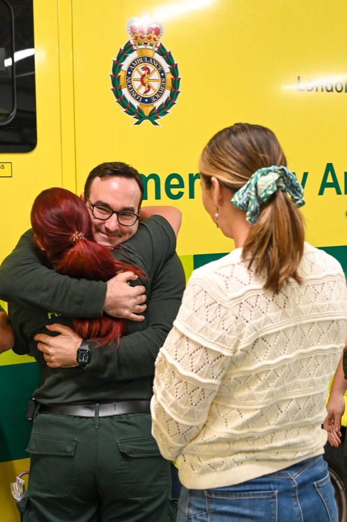 Patrick hugging paramedic Liz