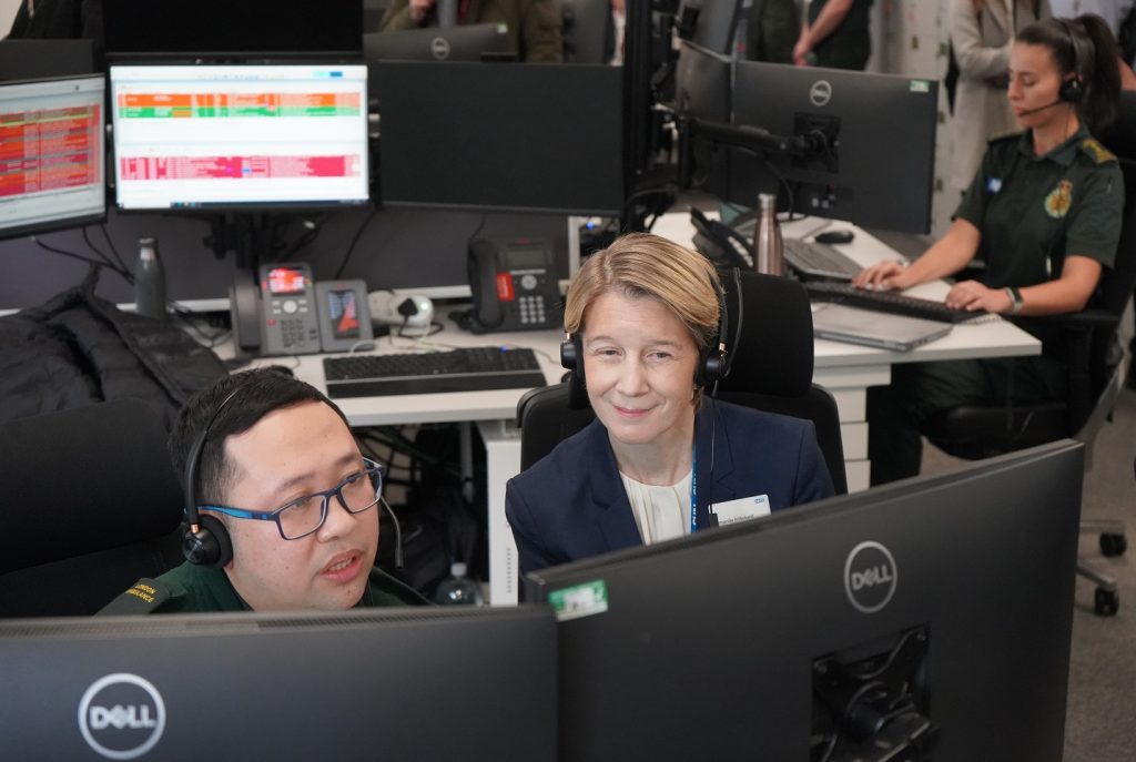 Amanda Pritchard listens to a call in the LAS Clinical Hub. 