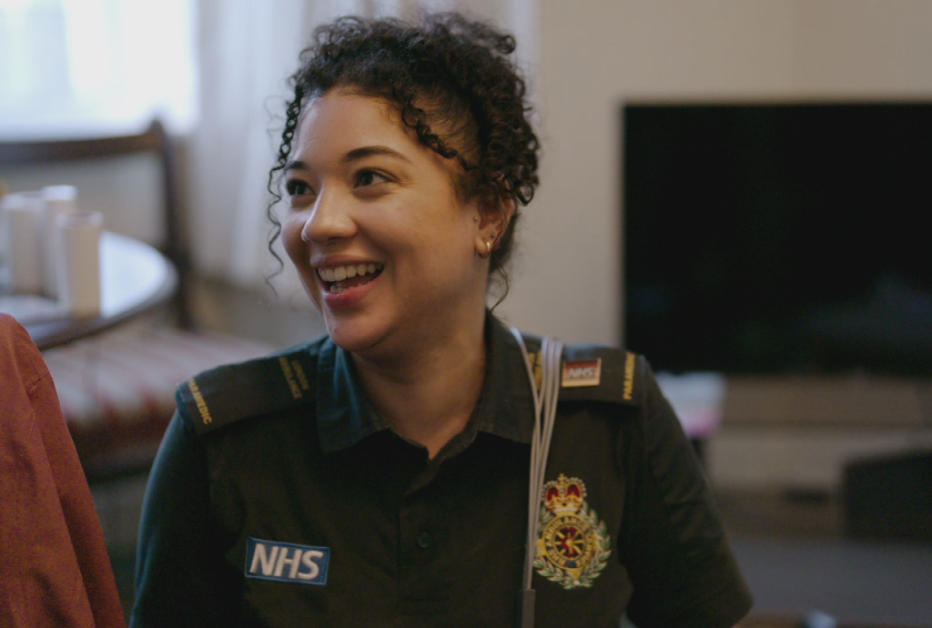 Shyr-Nai in her uniform at the home of patient. 