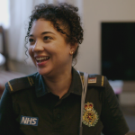 Shyr-Nai in her uniform at the home of patient.