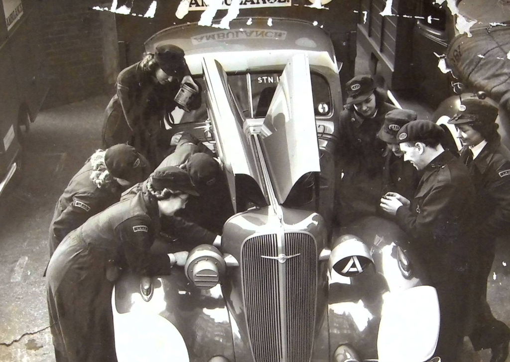 Women learning ambulance maintenance skills in London as part of their training during World War II